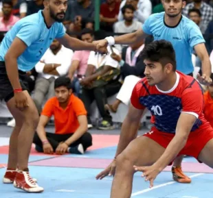 Indian men engaged in a spirited game of kabbadi, showcasing their agility, focus & competitive spirit with sportswear