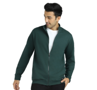 A man wearing a black tshirt,knitted hat and green shorts activewear, standing bold and confident